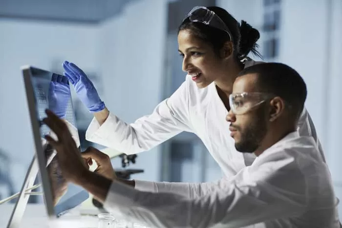 Scientists collaborating in a laboratory